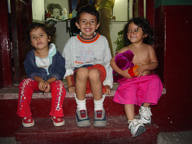 New Year's Eve, 2003: Children on a hairdresser's stoop, Salta